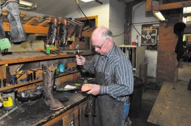 Mike Ryan at work in his Helena bootmaking shop.