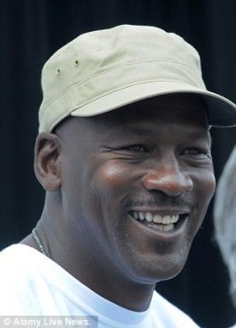 Money man: Michael Jordan recently increased his ownership stake in Charlotte Hornets and that assisted drive his net worth over billion