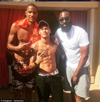 Neymar (centre) has also met NBA stars Trevor Ariza (left) and James Harden (right) in the United States