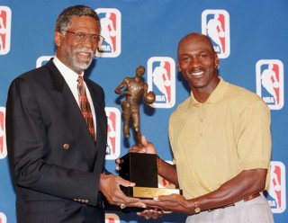 Phil Jackson would simply take Bill Russell (left) over Michael Jordan if given the option. (Jeff Haynes AFP/Getty)
